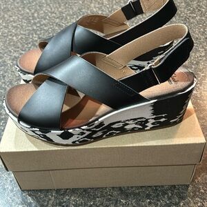 Clarks wedge sandals with black and white Ikat print